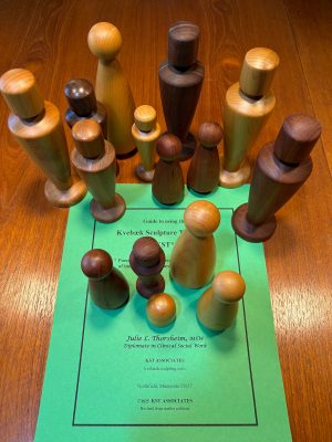 A print version of the KST manual, shown with the figures